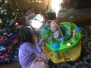 Jordan and Jude play with the Exersaucer